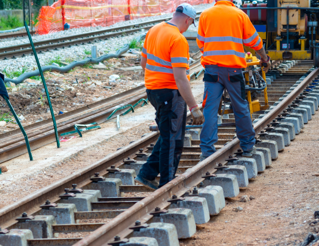 Workers working on the railway line- Business Advantages of RISQS