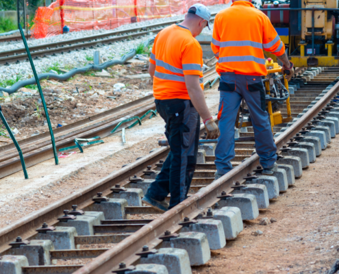 Workers working on the railway line- Business Advantages of RISQS